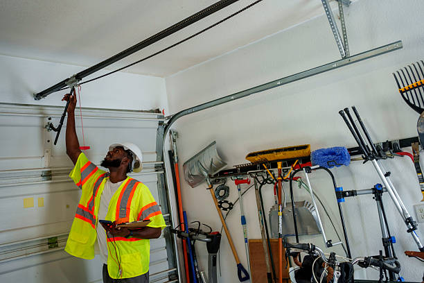 Professional Garage Door Panel Replacement technician working in Edgewater, NJ
